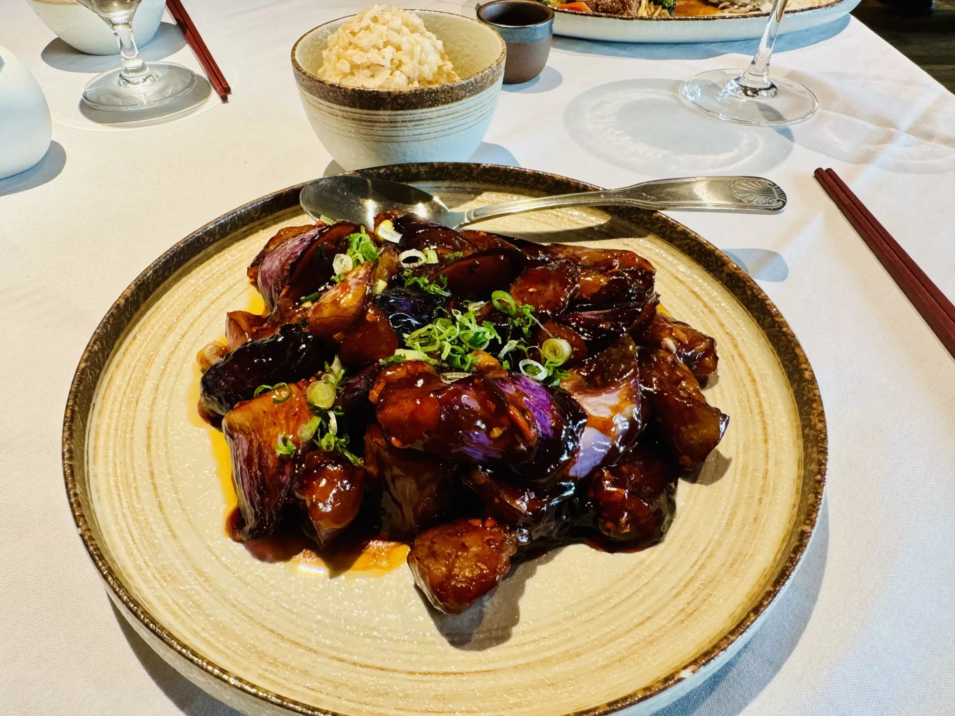 Feng Shui Fine Asian Cuisine signature dishes Peking Duck, Black Pepper Beef Tenderloin, Honey Glazed Sea Bass, Crispy Spicy Prawns